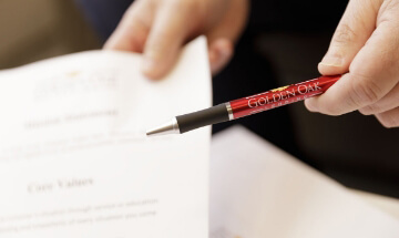 Legal document with pen ready to sign