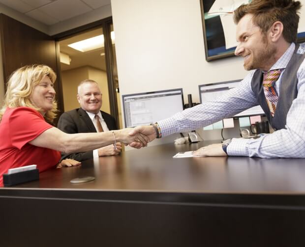 Loan Officer shaking hands with a client