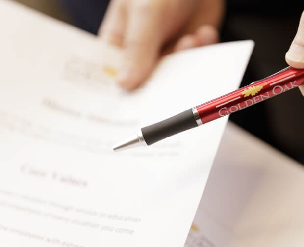 Legal document with pen ready to sign